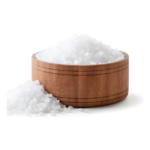 Close-up of coarse salt-like mineral in a wooden bowl